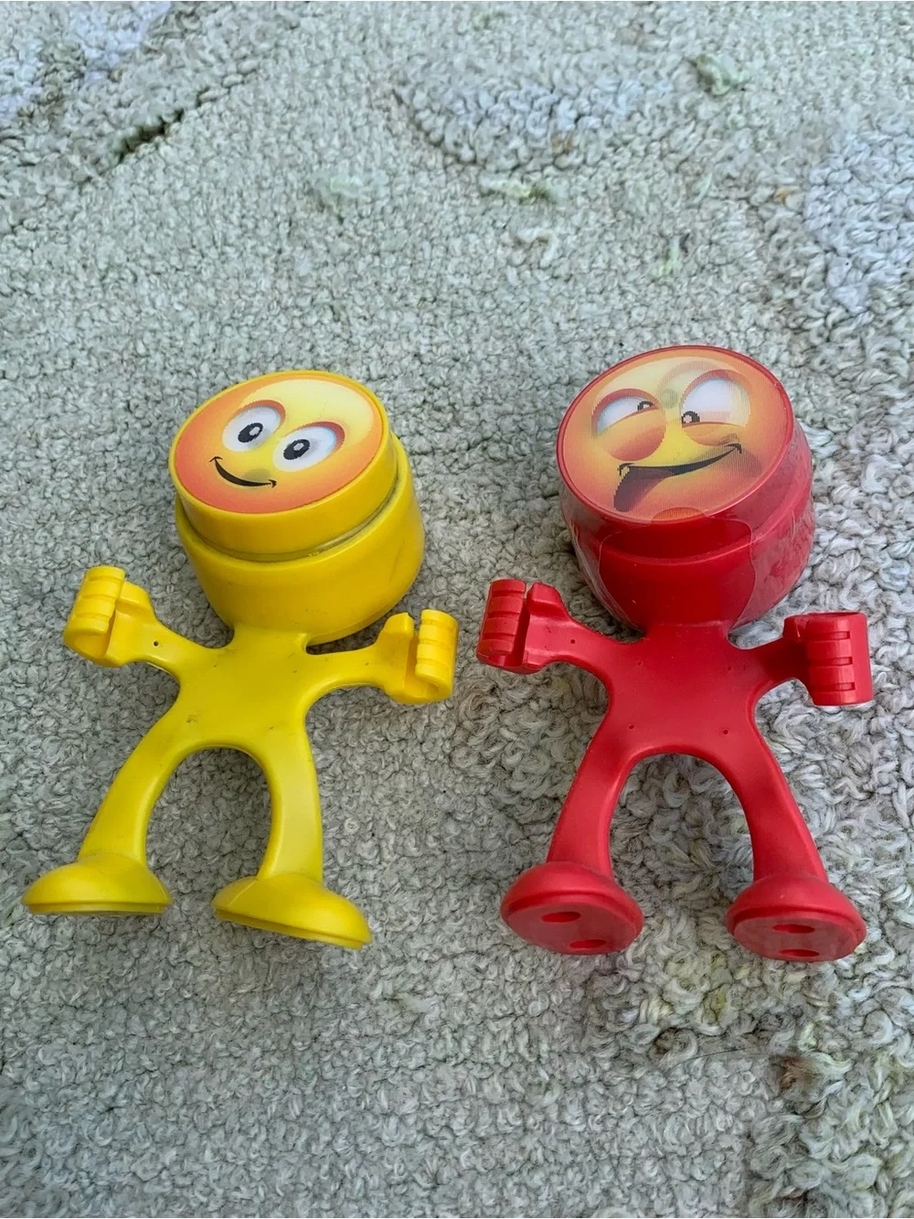 Lot of 2 red and yellow novelty emoji pencil sharpener and holder